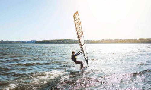 young-man-with-kitesurf-board-1